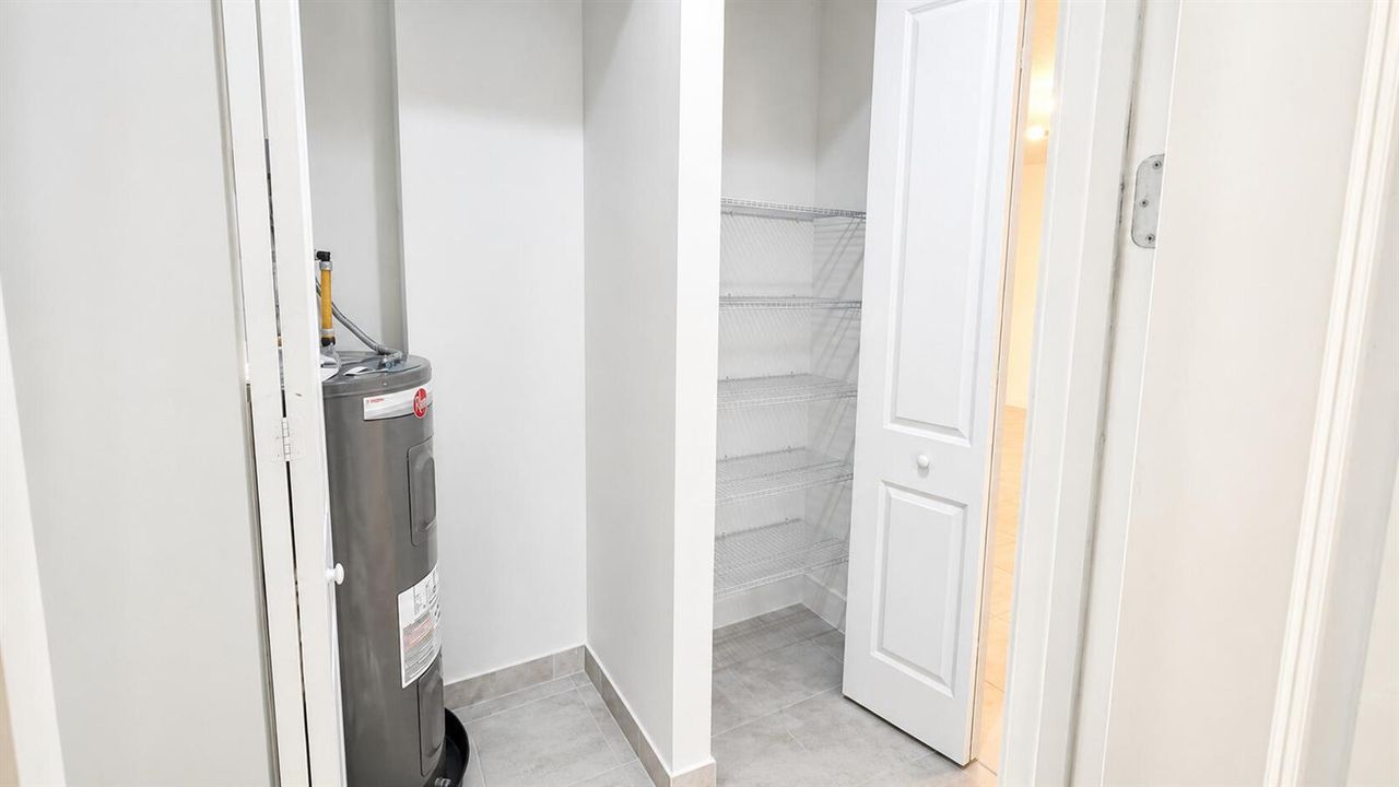 WATER HEATER AND STORAGE CLOSET - Image