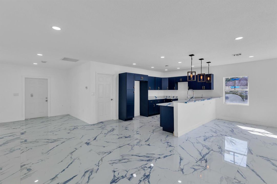 VIEW OF KITCHEN / FOYER