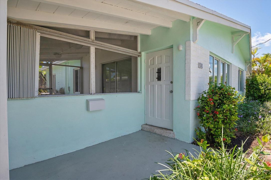 Front door entryway and screened patio o