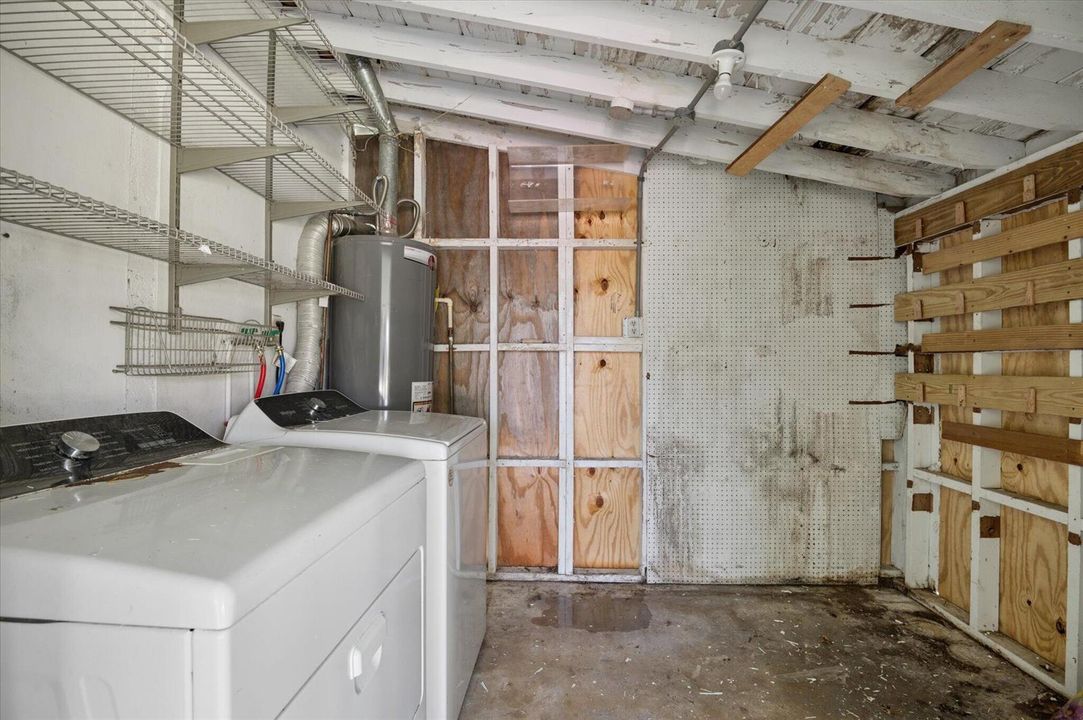 Utility Room behind carport attached to
