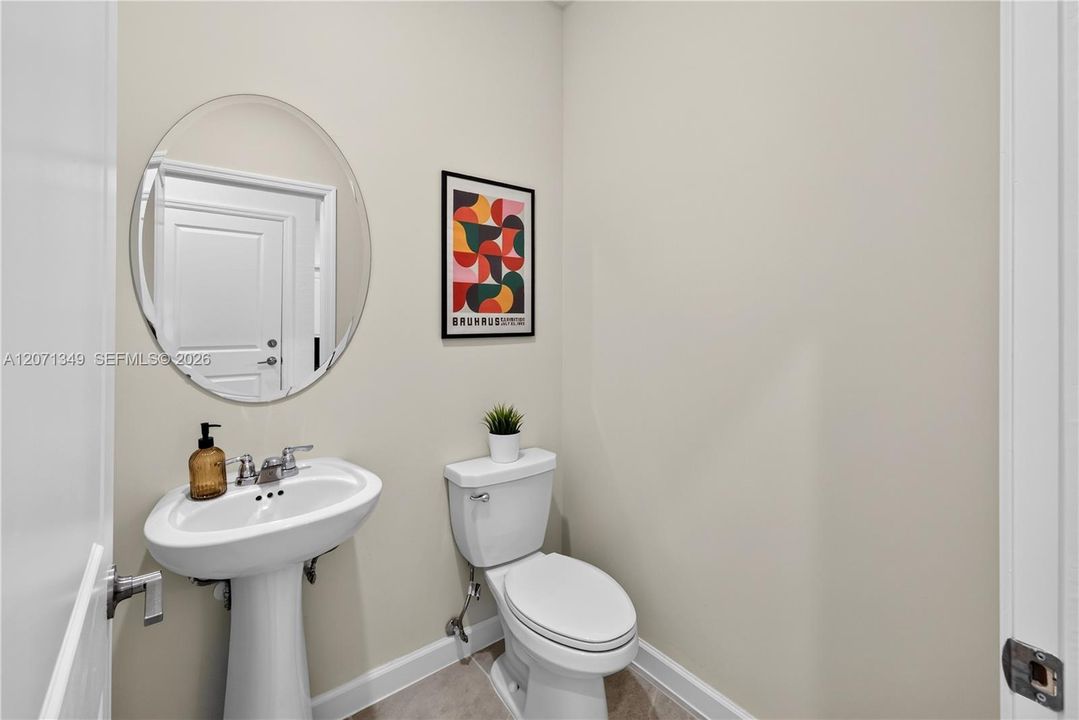 The powder room delivers much-needed convenience and access near the main living area.