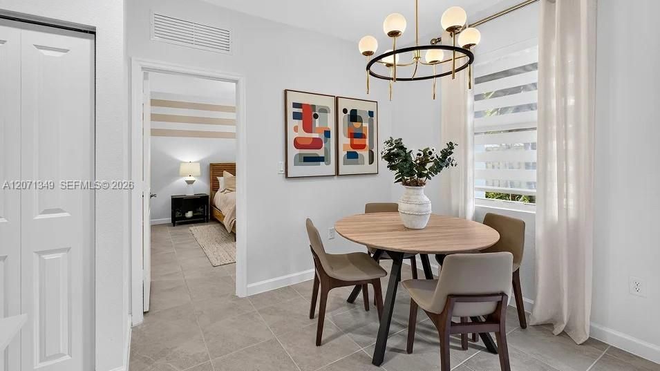 A charming breakfast nook sits just off the kitchen, ready for anything from casual meals to morning coffee.