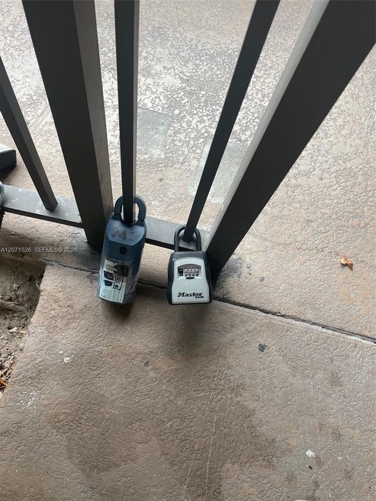 Supra Lockbox next to the Building Front door and  Mailbox