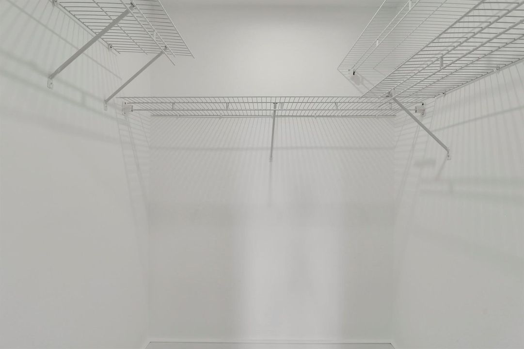 Primary Bedroom Walk In Closet