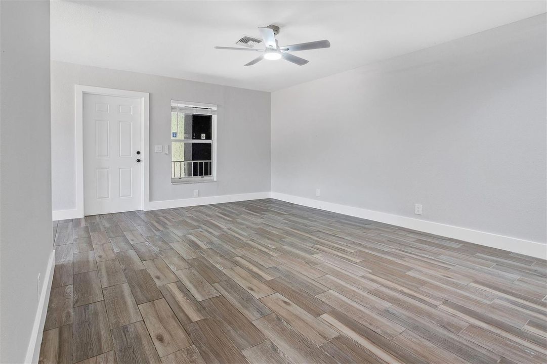 LIVING ROOM LOOKING TO ENTRANCE