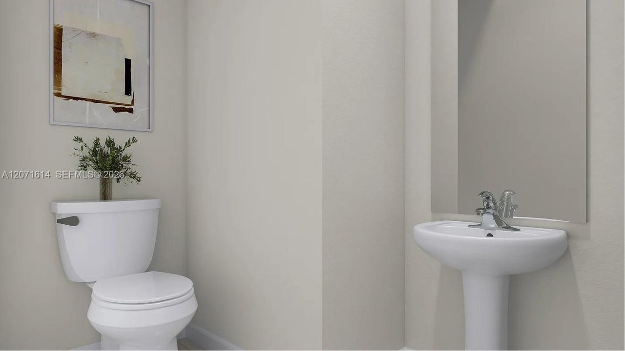 Located off the foyer is a convenient powder room to optimize the first-floor main living area for residents and guests.