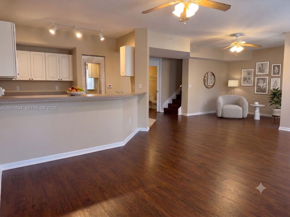Overlooking kitchen and den