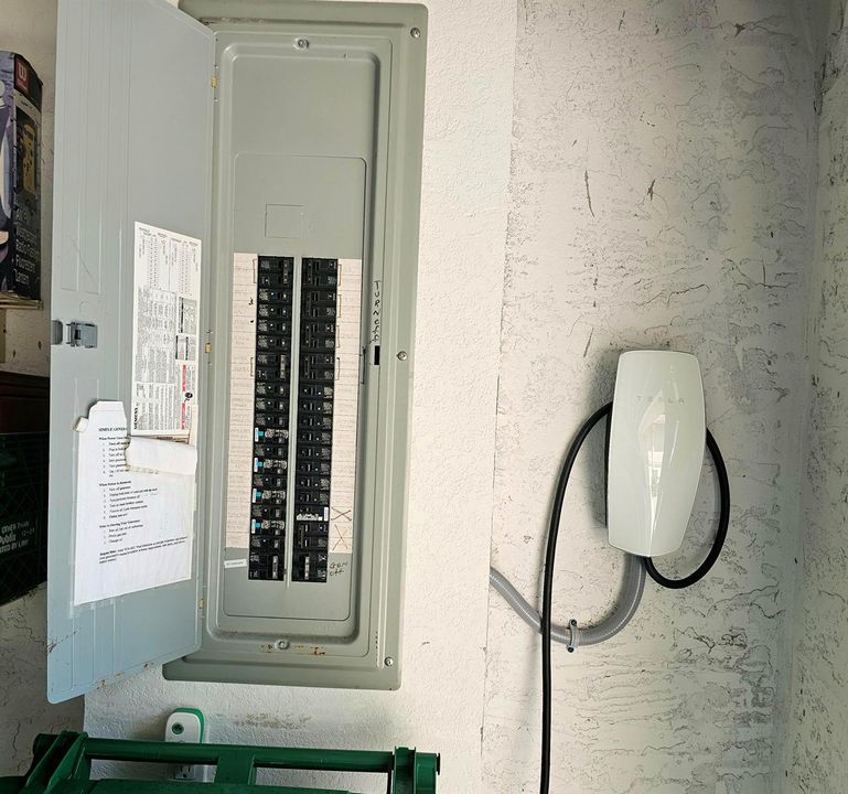 E-panel with Tesla Charger
