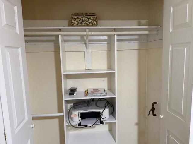 Guest bedroom custom racked closet