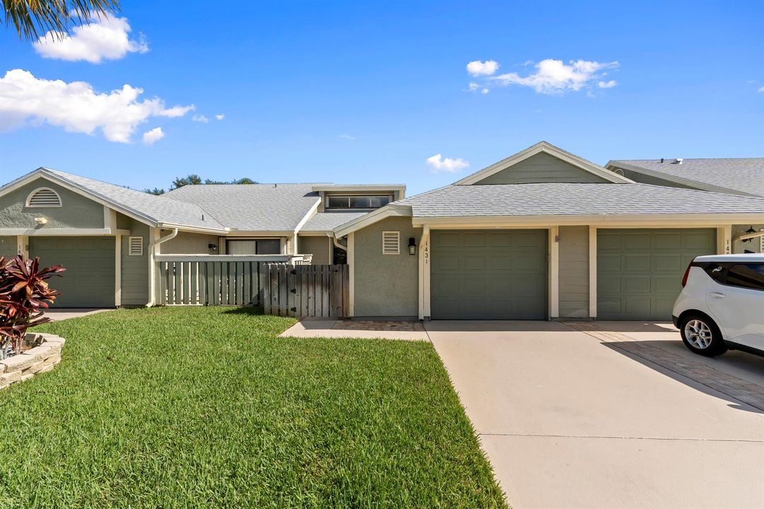 Front elevation with wider driveway