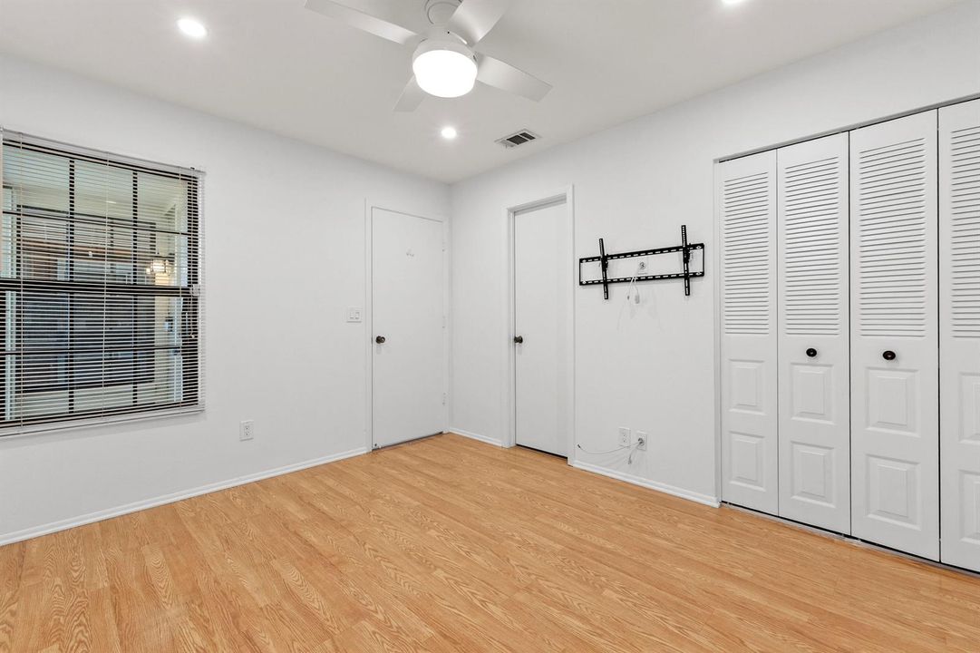 Guest bedroom with door to bathroom