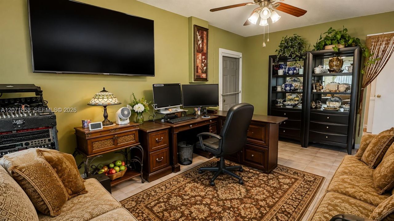 4TH ROOM BEING USED AS AN OFFICE IN THE PREVIOUSLY CONVERTED GARAGE