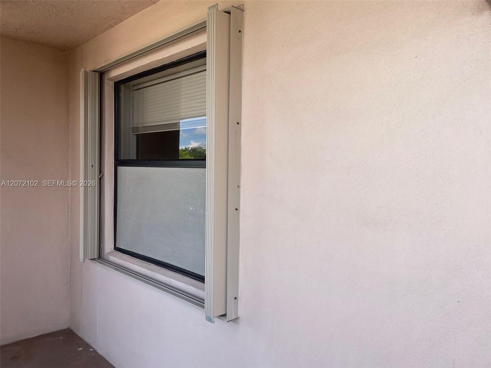 ACCORDIAN SHUTTERS