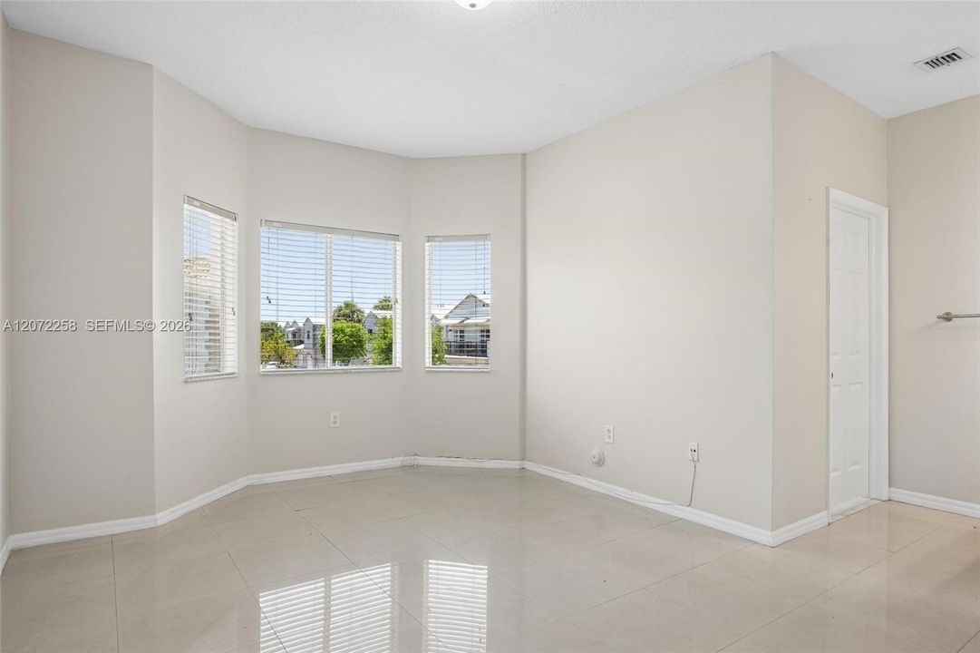 MASTER BEDROOM WITH BEAUTIFUL WINDOWS
