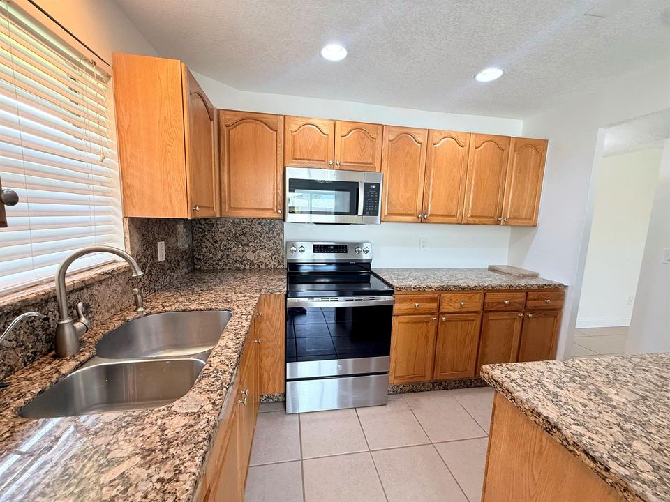 Granite Counter Tops Throughout