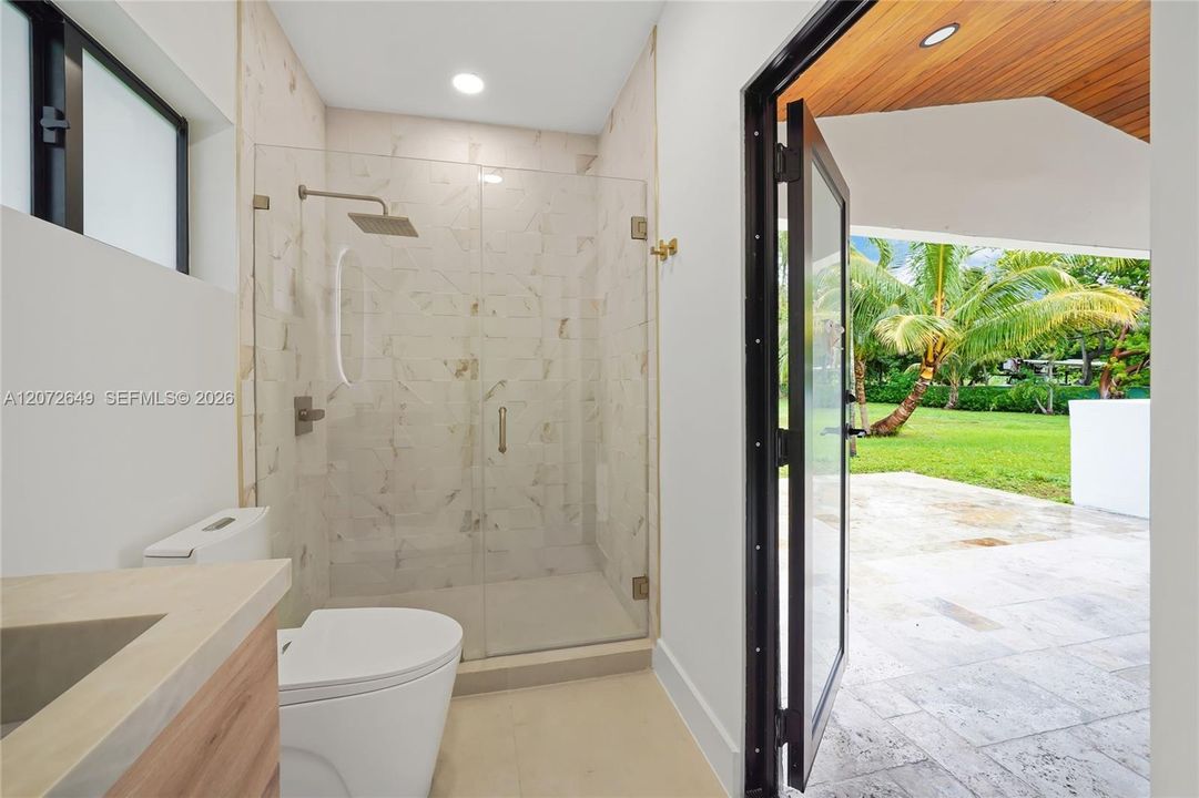 Bathroom No. 5 Cabana Bathroom, conveniently located close to the pool. Serves as guest bathroom and cabana, for pool days!