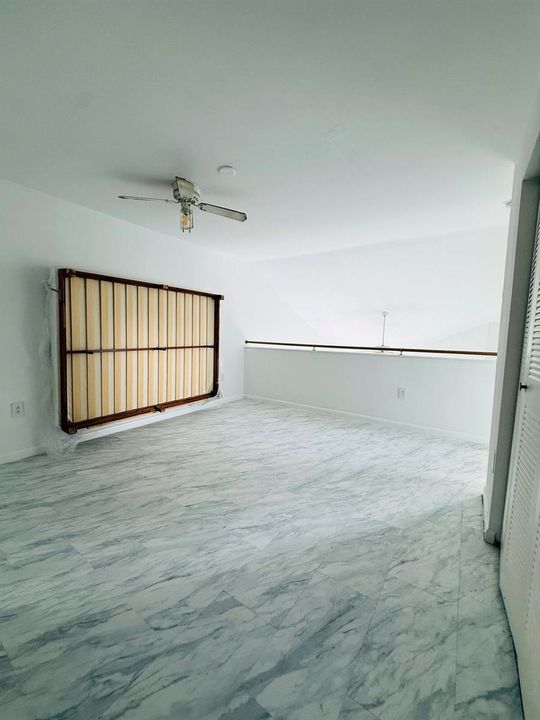 Upstairs flex space with convertible bed