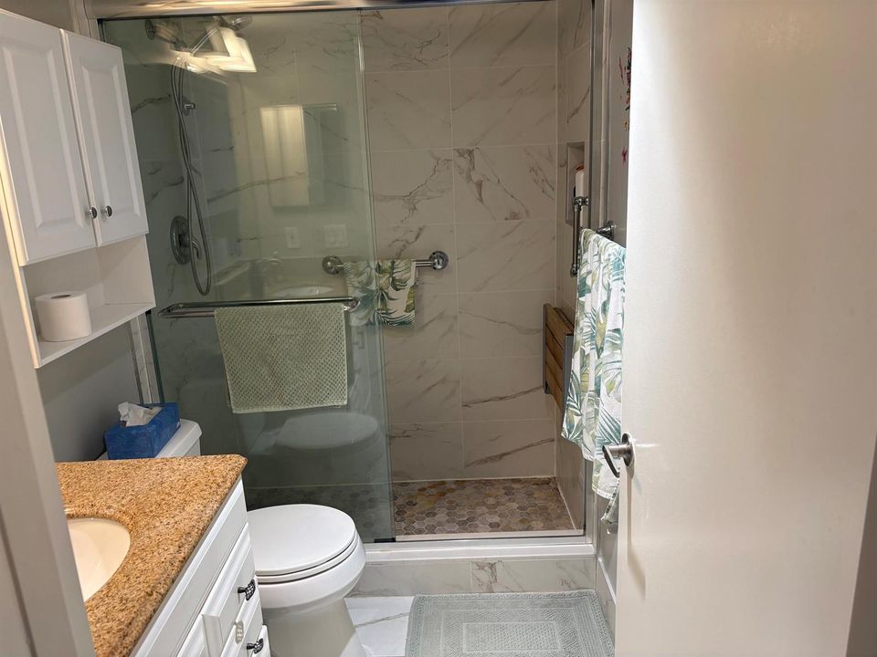 BATHROOM W/STALL SHOWER