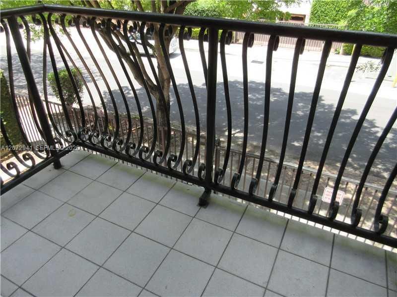 Open balcony facing front of bldg