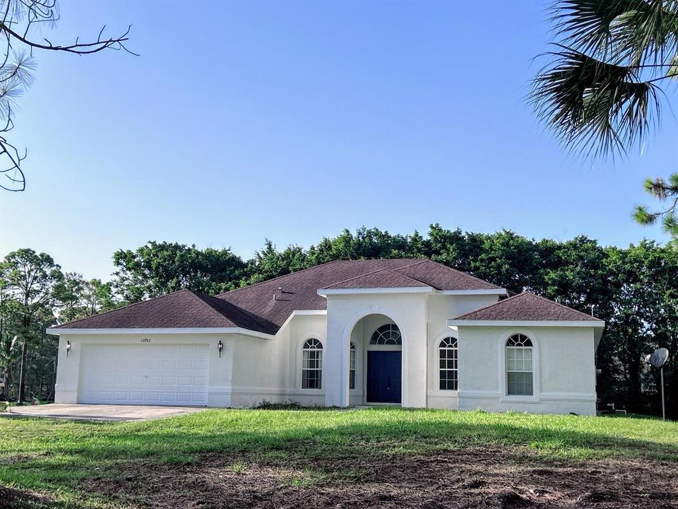 Wooded Across Back of Property