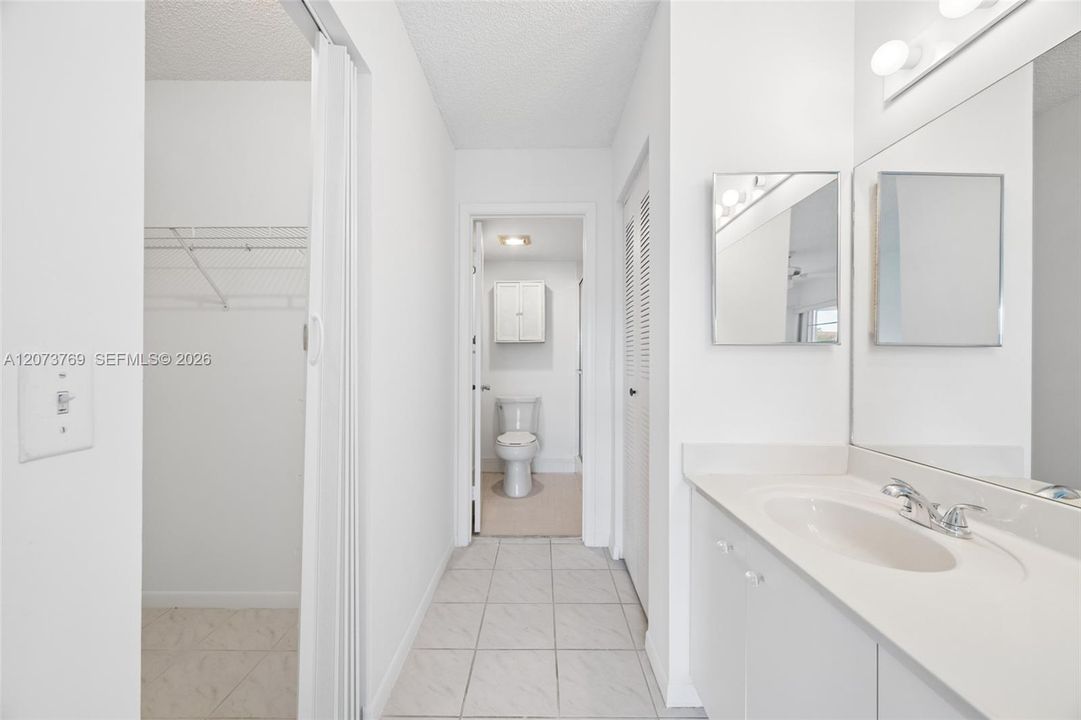 Master Walk-In Closet and Master Bathroom