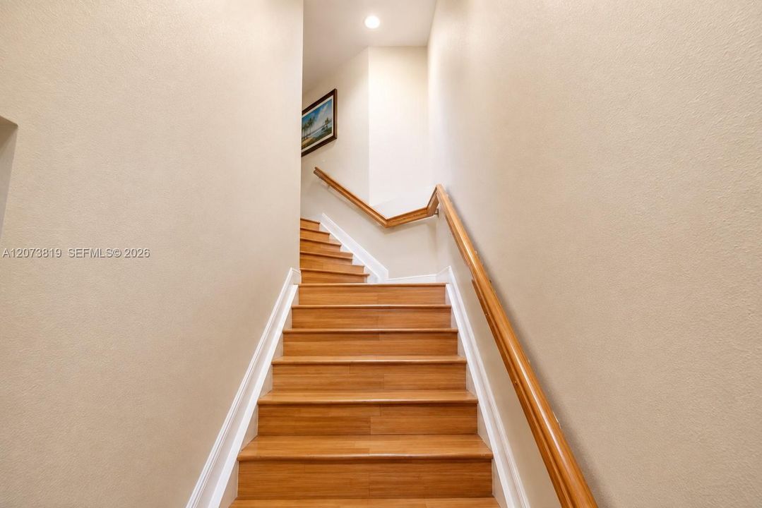 Upon entry from garage or outside, up one flight of internal stairs where all living for your 3/2 is on the 2nd floor above it all.