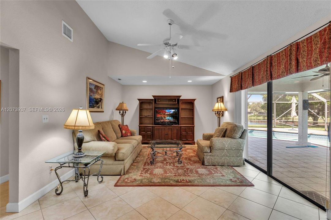 Lovely family room just off the pool