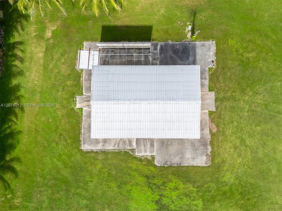 LARGE CONCRETE SLAB WRAPS BUILDING...