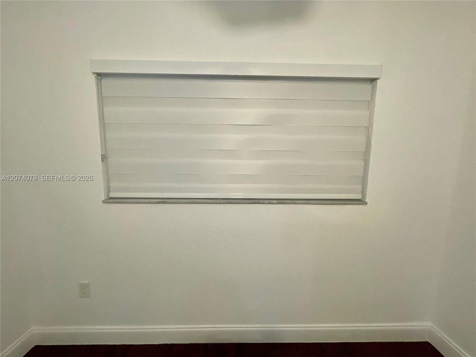 Black out shades in bedroom.