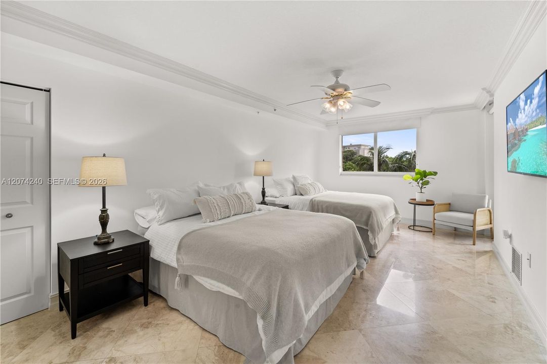 Spacious primary with 2 queen beds