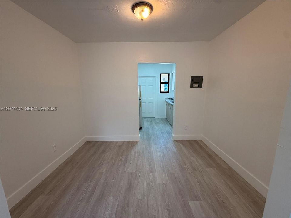 Den perfect for dining area or office space