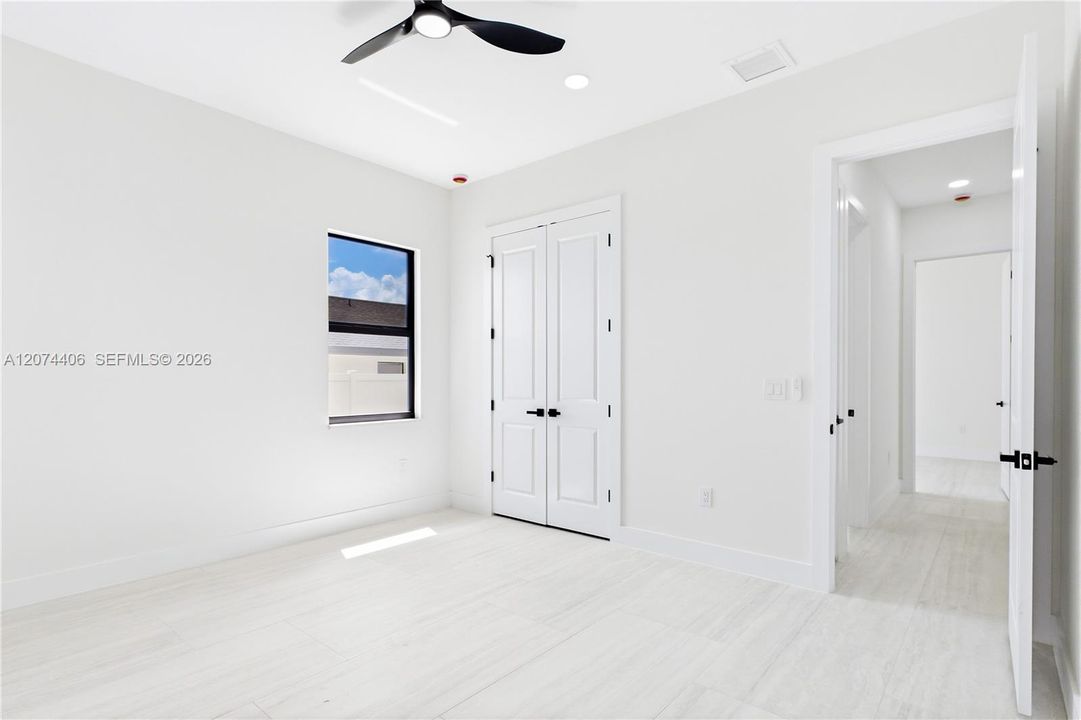 SPLIT LAYOUT w/ SECOND PRIMARY SUITE w/ POOL BATHROOM & TWO GUEST BEDROOMS w/ HALL BATHROOM for added privacy.