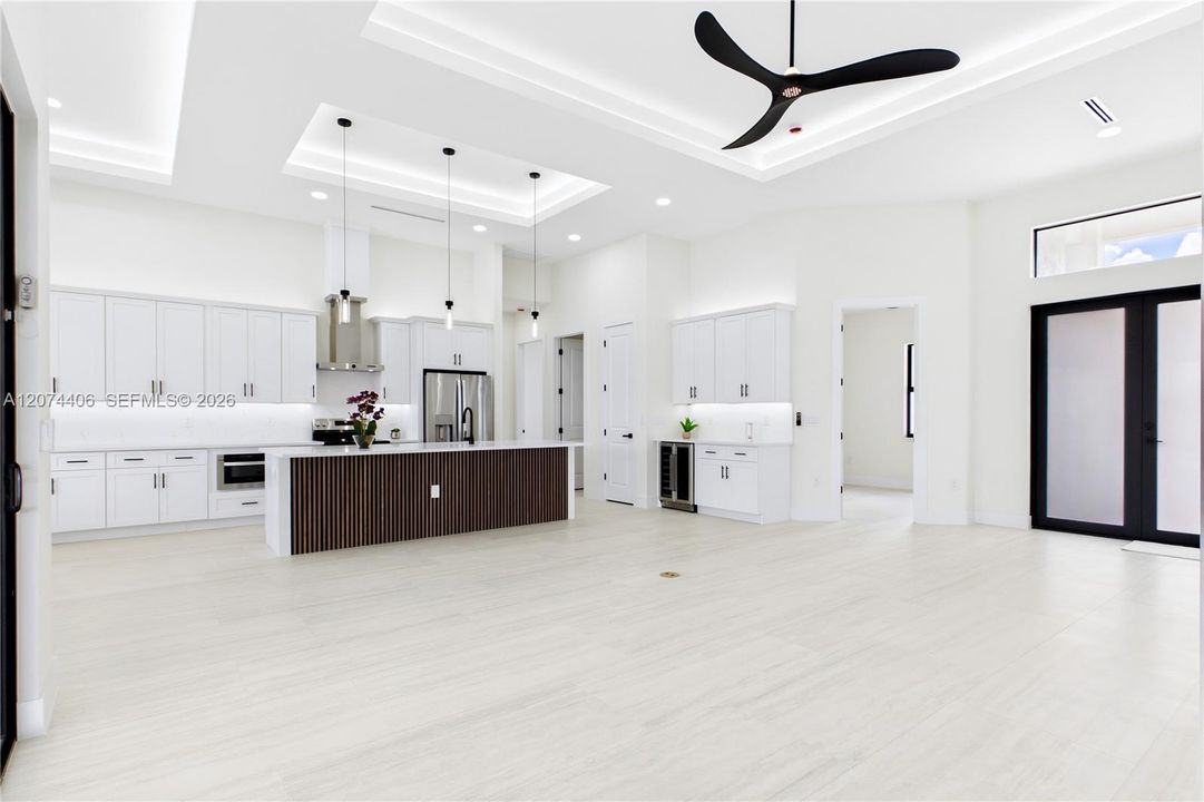 Bright, open layout w/ LIGHT NEUTRAL TILE FLOORING.