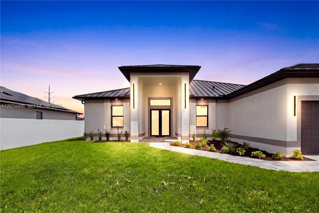 This CONTEMPORARY LUXURY HOME features SCREENED, HEATED POOL & SPA & 4 BEDS (2 primary suites) & 3 full BATHS, layout is ideal for EVERYDAY LIVING & ENTERTAINING!