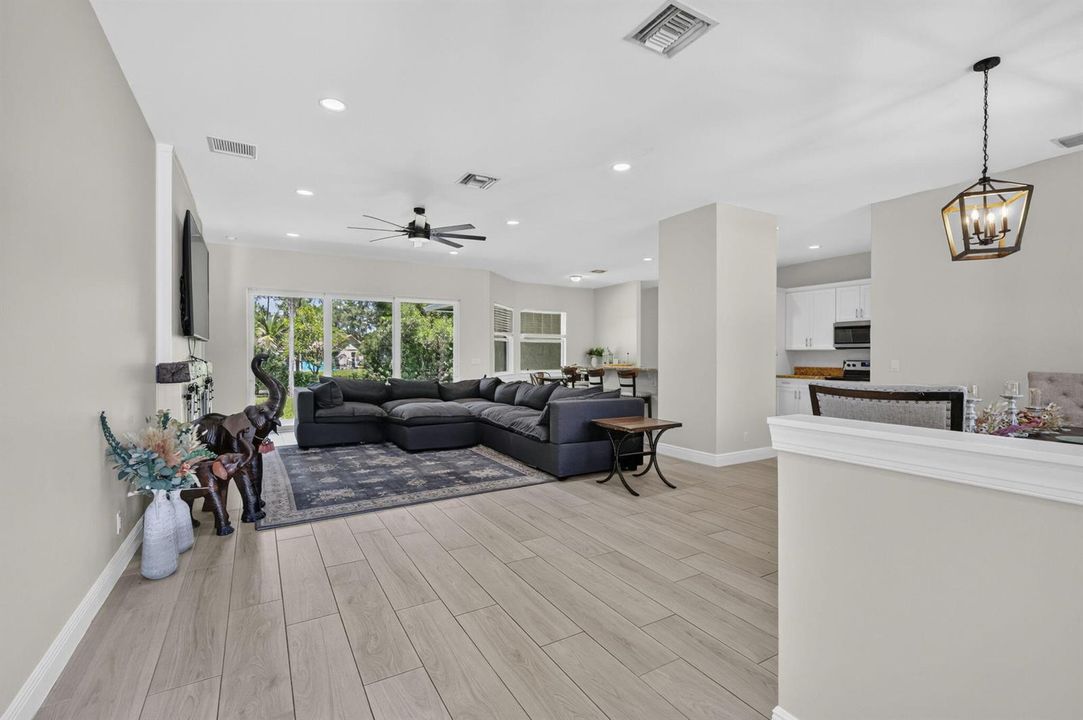 ENTRY VIEW, LIVING, DINING, KITCHEN