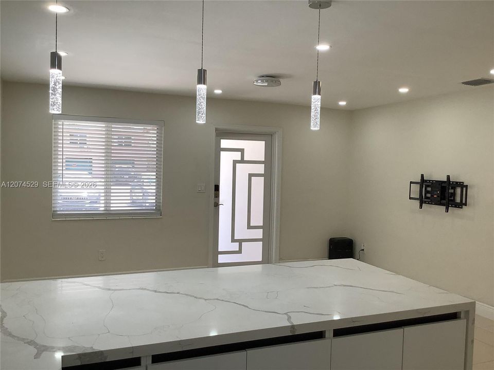 modern lighting and kitchen cabinets