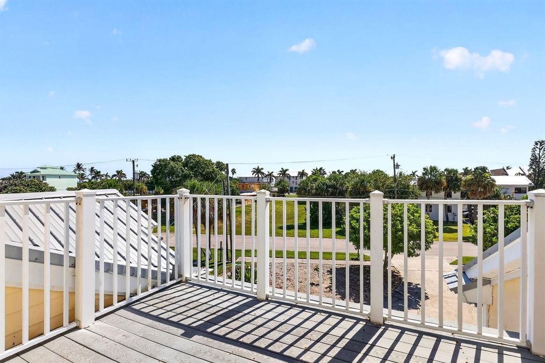 BALCONY OFF MASTER WITH OCEAN VIEWS