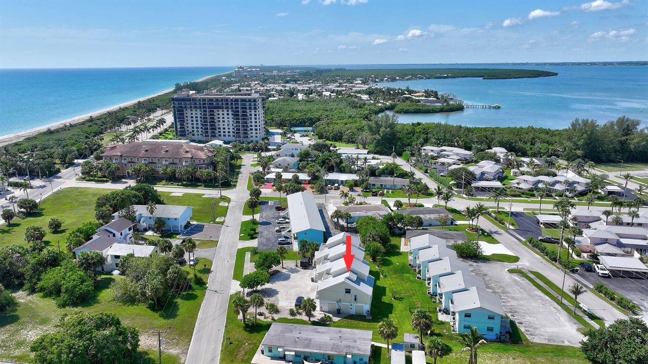 NESTLED BETWEEN INTRACOASTAL & OCEAN....