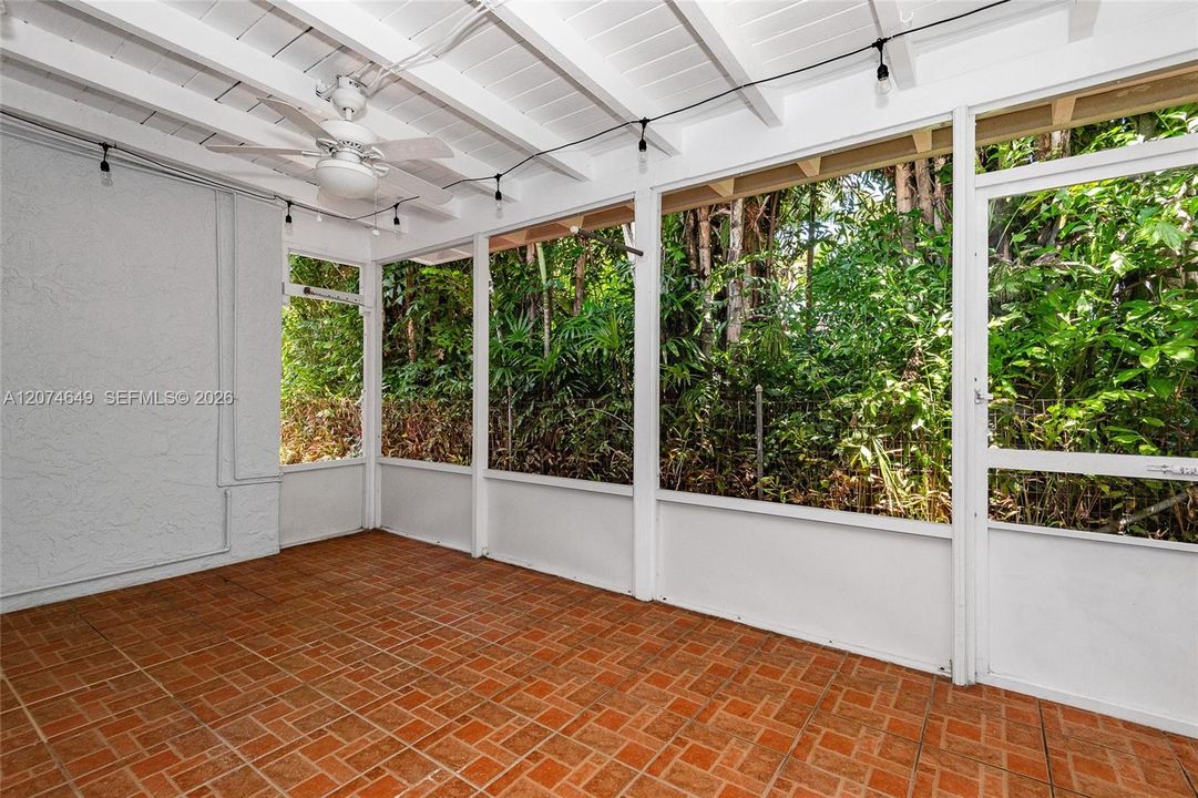A screened in and roofed patio to spend time outdoors.