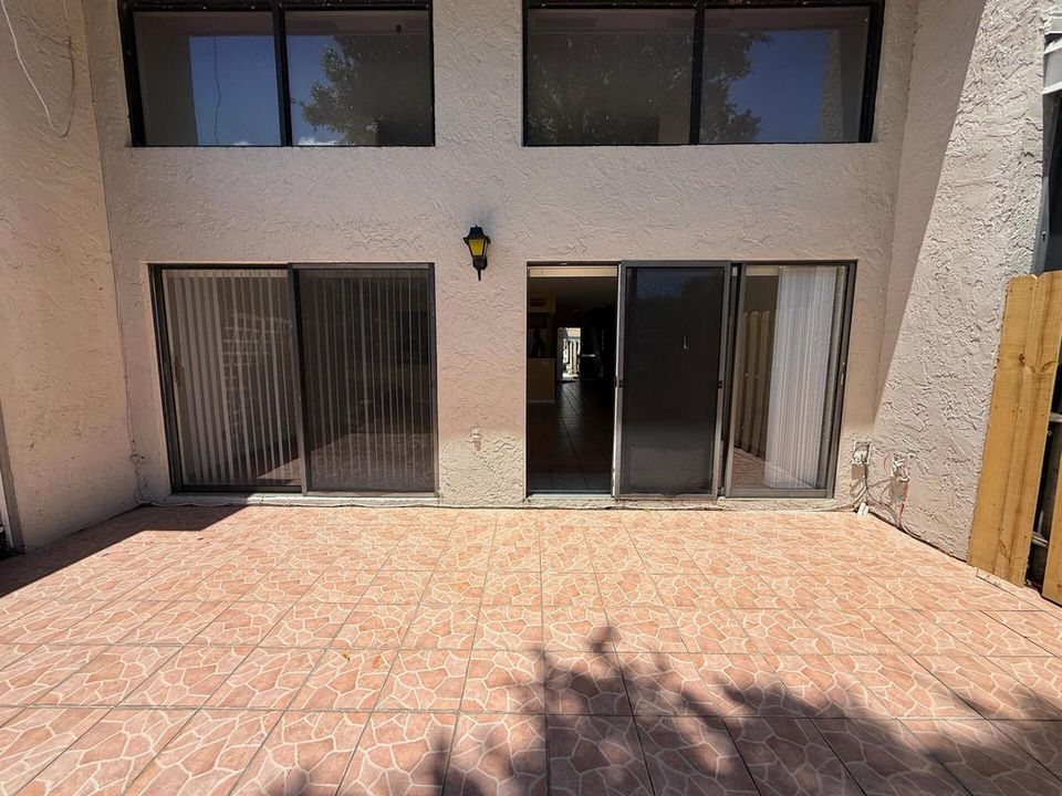 Lisa looking at back patio
