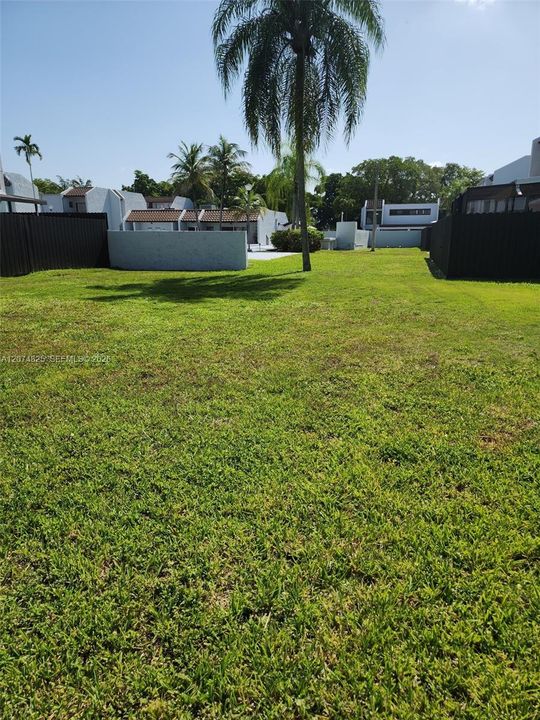 Greenspace off Private Patio leading to Pool