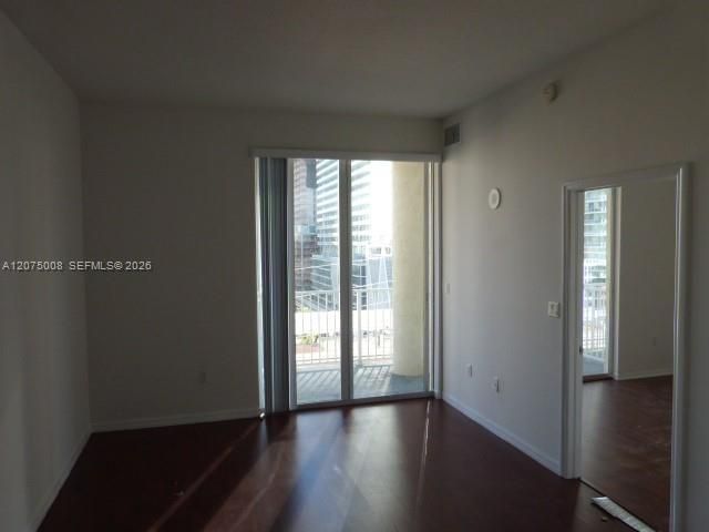 Living Room / Bedroom with long balcony across both