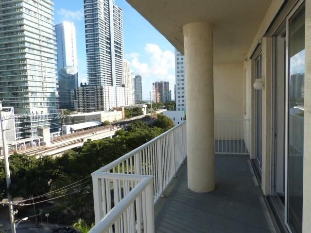 spans full width of balcony