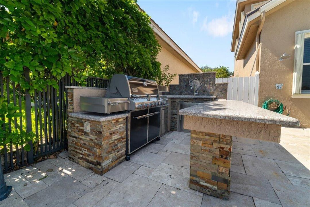 The summer kitchen in the back patio