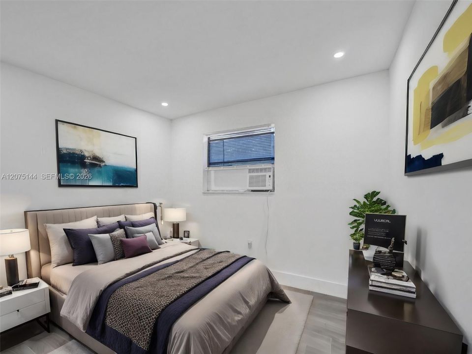 The unit is UNFURNISHED- This photo is VIRTUAL STAGED FOR VISUALIZATION