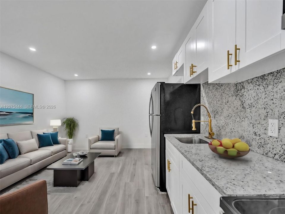 The unit is UNFURNISHED- This photo is VIRTUAL STAGED FOR VISUALIZATION