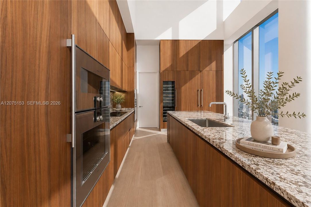 Kitchen. UNA Residences Brickell. One or more photos have been virtually staged.