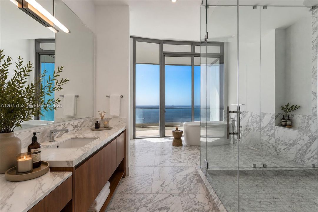 Primary Bathroom. UNA Residences Brickell. One or more photos have been virtually staged.