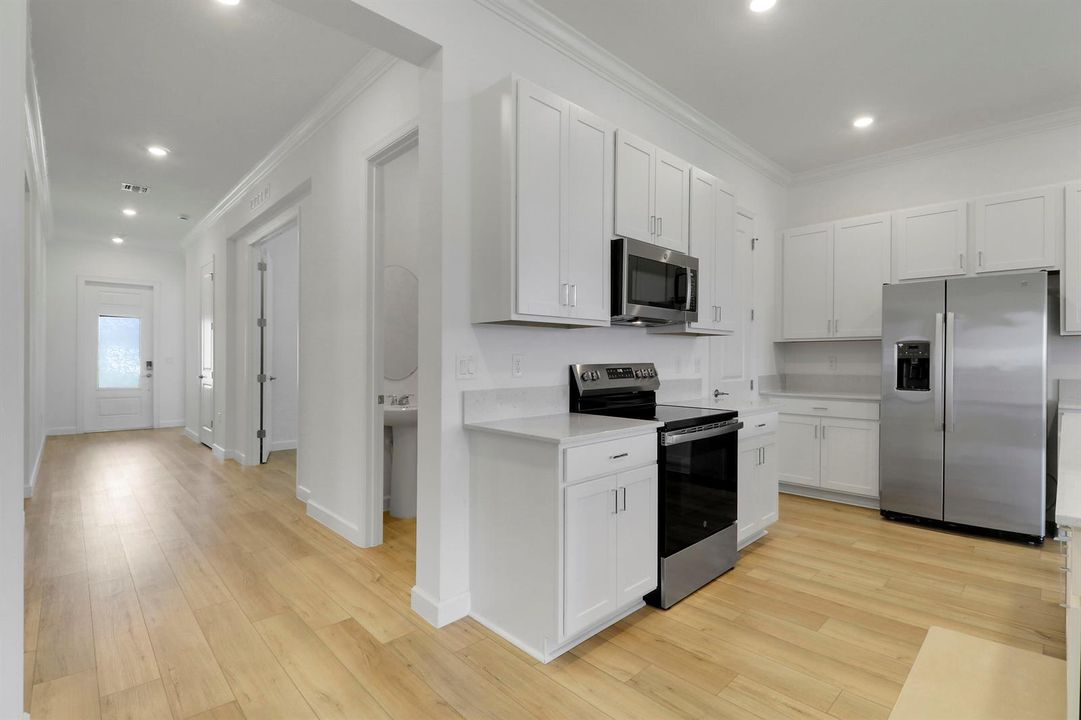 Kitchen w/ hallway angle