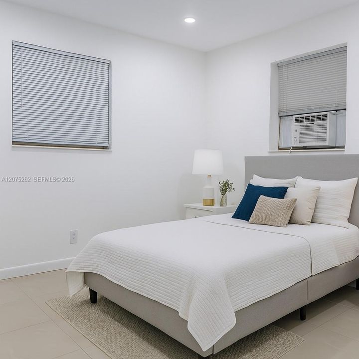 The unit is UNFURNISHED- This photo is VIRTUAL STAGED FOR VISUALIZATION